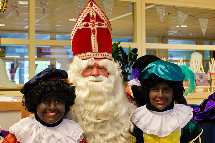 Aankomst van de Sint en zijn Zwarte Pieten in Waarder_146